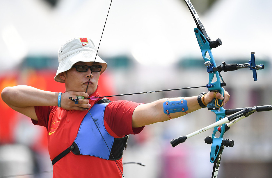 射箭选手操如熟练,射中靶心取胜的简单介绍 射箭选手操如熟练,射中靶心取胜的简单介绍